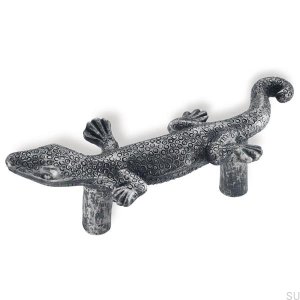 Elongated furniture handle for a lizard. Ancient black