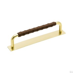 Elongated furniture handle with a Royal Deluxe pad 128 Brass Brown Leather