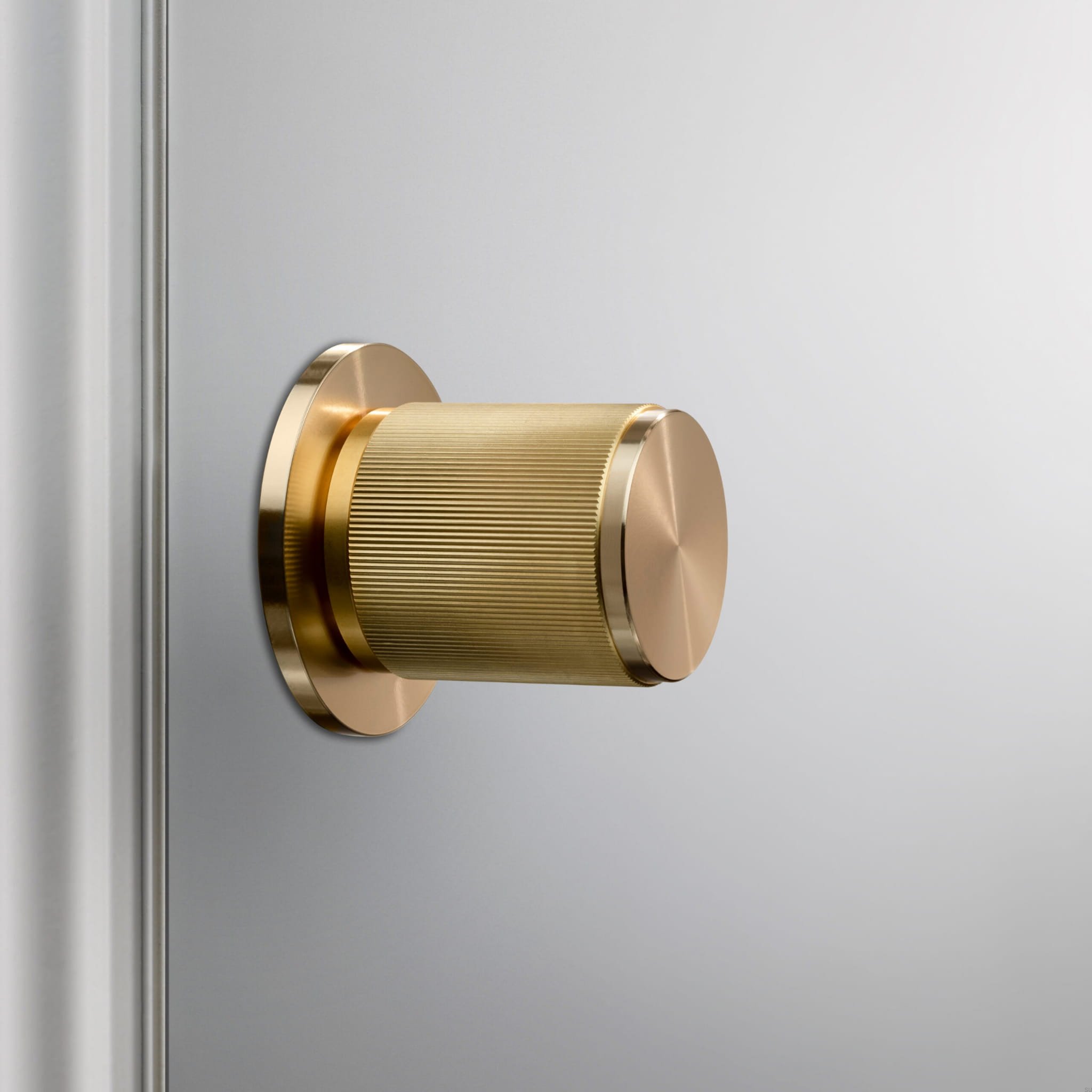 ROWFixed_Door-Knob_Linear_Brass_A3_Web_Square-scaled (1).jpg