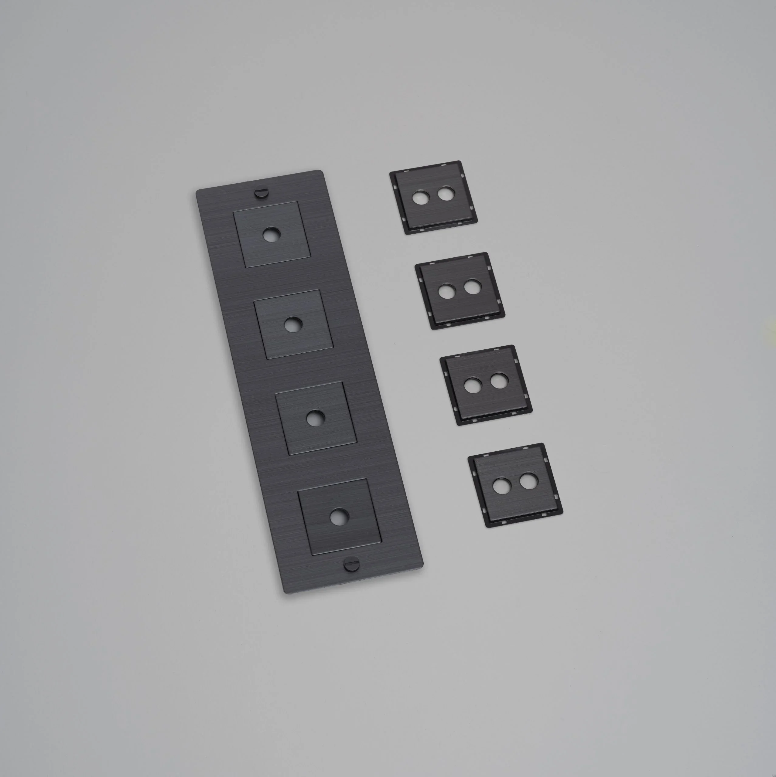 EU_ELECTRICITY_4G_Vertical_Wall_Plate_Infill_SmokedBronze-scaled.webp