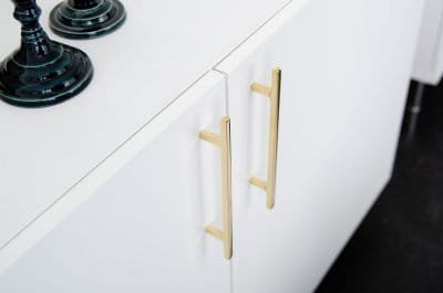 Flat Line 128 oblong furniture handle, polished brass, unvarnished