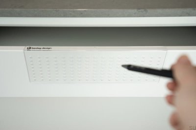 Template for drilling holes for handles and knobs