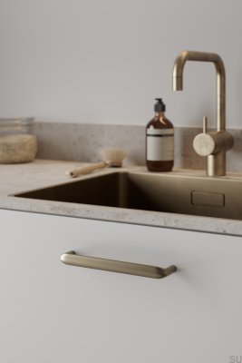 Cobra 160 elongated furniture handle, brushed gold metal