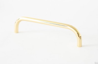 Grip 136 elongated furniture handle, polished brass