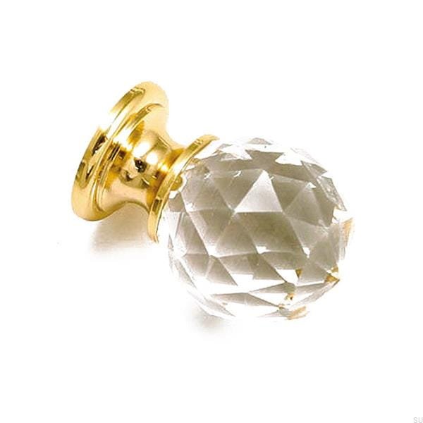 Zdjecie galki krysztalowej na zlotej stopie