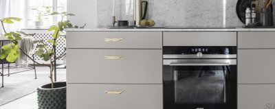 Elongated furniture handle with Royal Deluxe 96 washer, polished brass